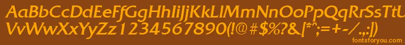 フォントQuadratRegularita – オレンジ色の文字が茶色の背景にあります。