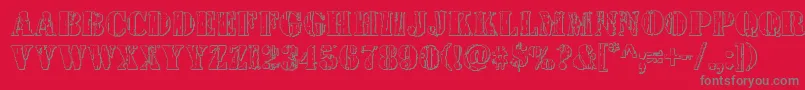 Wetworks3D-fontti – harmaat kirjasimet punaisella taustalla
