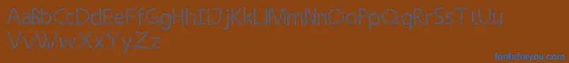 Strongleaf Font – Blue Fonts on Brown Background