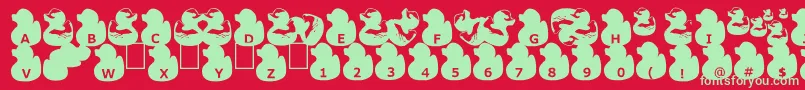 GugliDuckyRubber-fontti – vihreät fontit punaisella taustalla