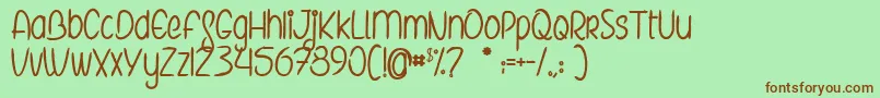 TheElvesAndTheSecretGarden Font – Brown Fonts on Green Background