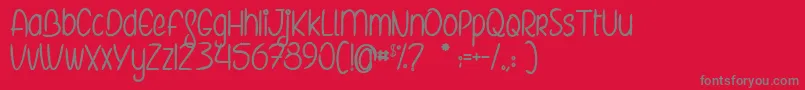 TheElvesAndTheSecretGarden Font – Gray Fonts on Red Background