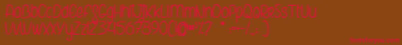 TheElvesAndTheSecretGarden Font – Red Fonts on Brown Background