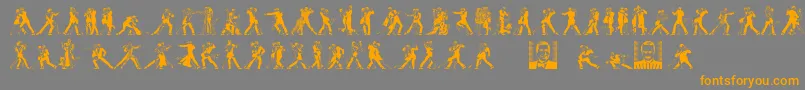 フォントTangomaniacsLtDay – オレンジの文字は灰色の背景にあります。