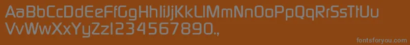 TqfPcmedium Font – Gray Fonts on Brown Background