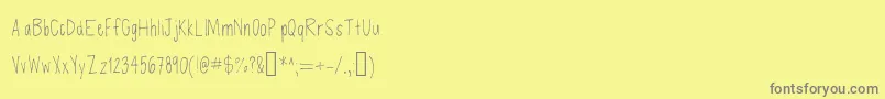 Czcionka Defenseless – szare czcionki na żółtym tle