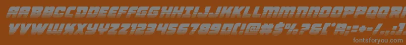 Victorycomicstwotoneital-fontti – harmaat kirjasimet ruskealla taustalla