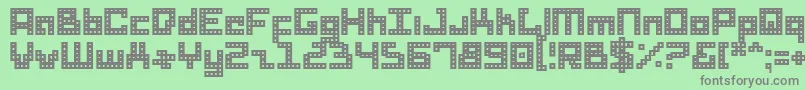 DridHerder Font – Gray Fonts on Green Background