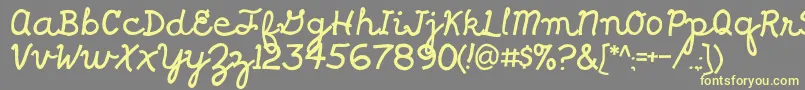 フォントShragscript – 黄色のフォント、灰色の背景