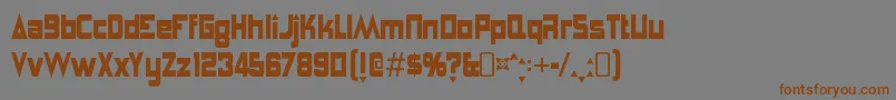 フォントAnglepoiselampshadeRegular – 茶色の文字が灰色の背景にあります。