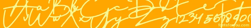 Czcionka DreamOnly – żółte czcionki na pomarańczowym tle