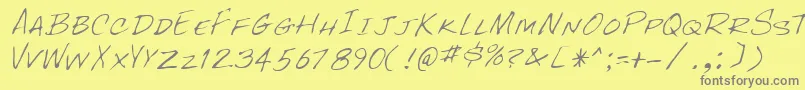RockyRegular-Schriftart – Graue Schriften auf gelbem Hintergrund