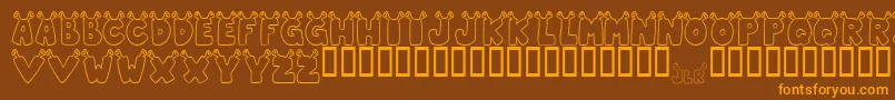 JlrStarShrek Font – Orange Fonts on Brown Background