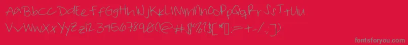 フォントTakemetuesday – 赤い背景に灰色の文字