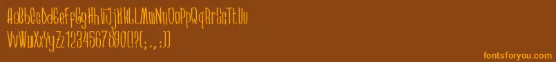 Arkara-Schriftart – Orangefarbene Schriften auf braunem Hintergrund