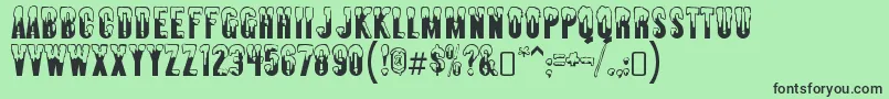 AlmontesnowRegular-fontti – mustat fontit vihreällä taustalla