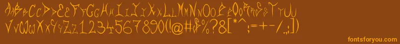 フォントRqf – オレンジ色の文字が茶色の背景にあります。