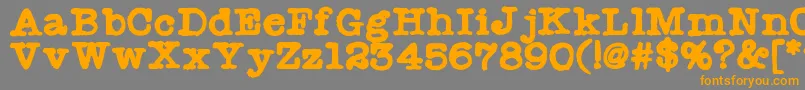 Radionewsman Font – Orange Fonts on Gray Background