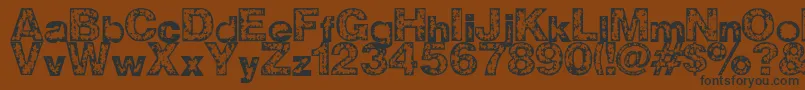 Z Wisdom Font – Black Fonts on Brown Background