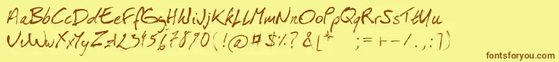 フォントIsaPorEsHomou – 茶色の文字が黄色の背景にあります。