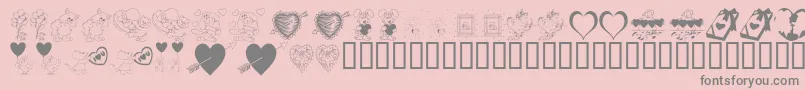 フォントKrBeMine – ピンクの背景に灰色の文字