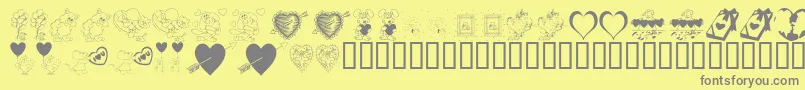 KrBeMine-Schriftart – Graue Schriften auf gelbem Hintergrund