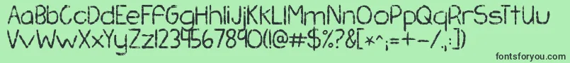 Шрифт Kgchasingpavements – чёрные шрифты на зелёном фоне