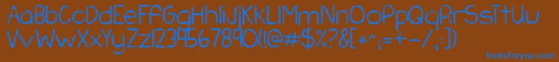 フォントKgchasingpavements – 茶色の背景に青い文字