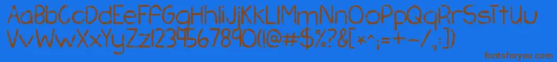 フォントKgchasingpavements – 茶色の文字が青い背景にあります。
