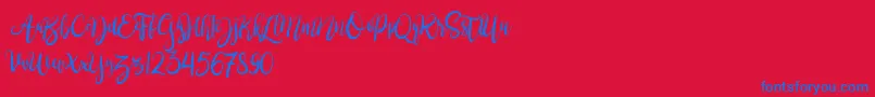 BrushgyoPersonalUse Font – Blue Fonts on Red Background