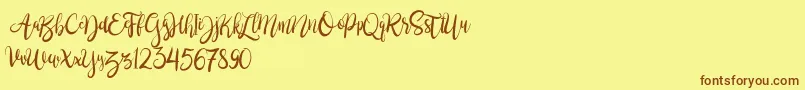 BrushgyoPersonalUse Font – Brown Fonts on Yellow Background