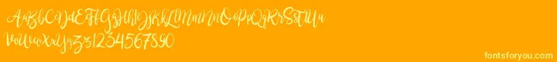 Fonte BrushgyoPersonalUse – fontes amarelas em um fundo laranja
