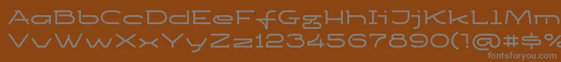 フォントKetosagcbd – 茶色の背景に灰色の文字
