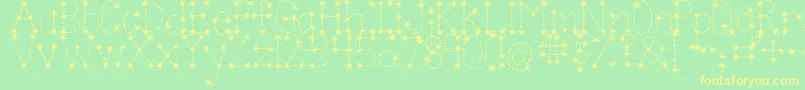 フォントJandasparkleandshinebold – 黄色の文字が緑の背景にあります
