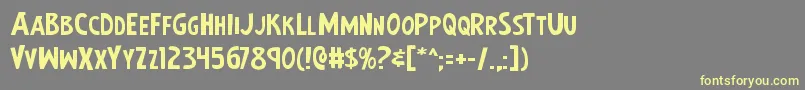 Earthsmightiestexpand Font – Yellow Fonts on Gray Background