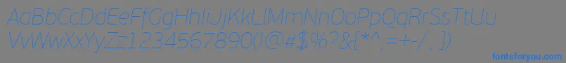 フォントPfbeausansproXthinitalic – 灰色の背景に青い文字