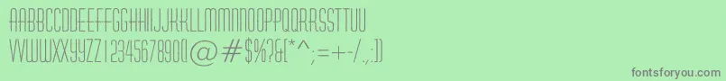 フォントHuxleyroughRegular – 緑の背景に灰色の文字