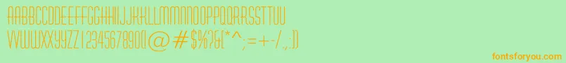 フォントHuxleyroughRegular – オレンジの文字が緑の背景にあります。