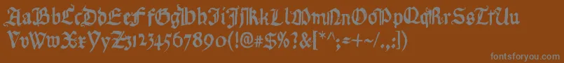 RequiemForA-Schriftart – Graue Schriften auf braunem Hintergrund