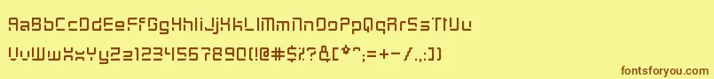 フォントGraycat – 茶色の文字が黄色の背景にあります。