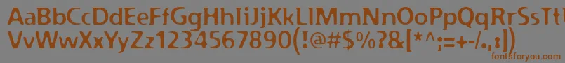 フォントPfplazmRegular – 茶色の文字が灰色の背景にあります。