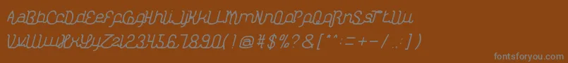 フォントKasihDanSayangThin – 茶色の背景に灰色の文字