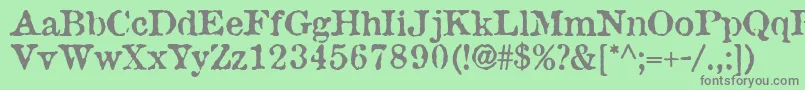 Fonte AntiqueType – fontes cinzas em um fundo verde