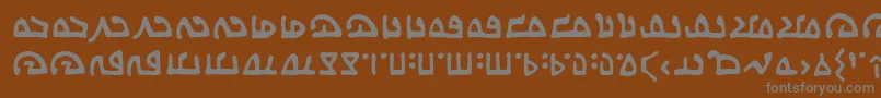 フォントWecomeinpeacebbReg – 茶色の背景に灰色の文字