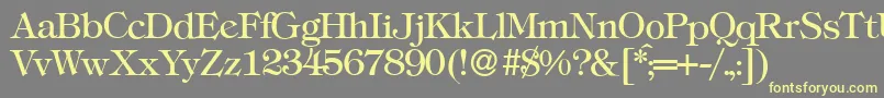 T731RomanRegular-fontti – keltaiset fontit harmaalla taustalla
