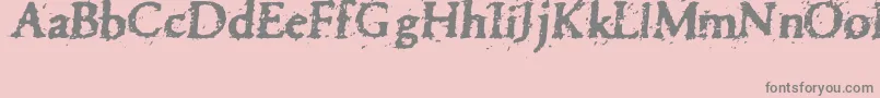 フォントPettra – ピンクの背景に灰色の文字
