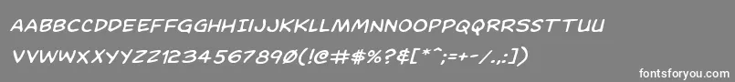 フォントDominomaskexpandital – 灰色の背景に白い文字
