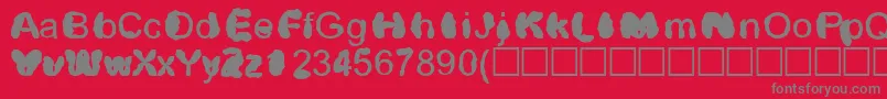 フォントDistrowt – 赤い背景に灰色の文字