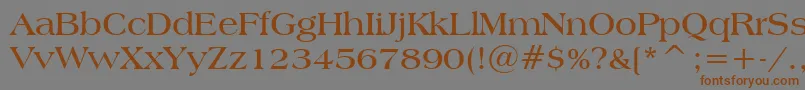 フォントAmericanaBoldBt – 茶色の文字が灰色の背景にあります。