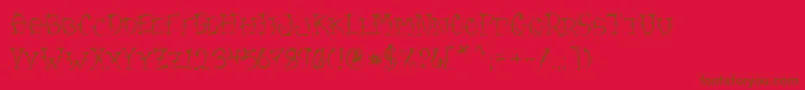 VtcSumislasheroneSc Font – Brown Fonts on Red Background